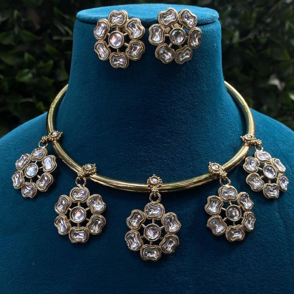 Handcrafted Gold Brass Hasli Choker with Kundan Pendant & Matching Earrings set - Sparkling Nailon
