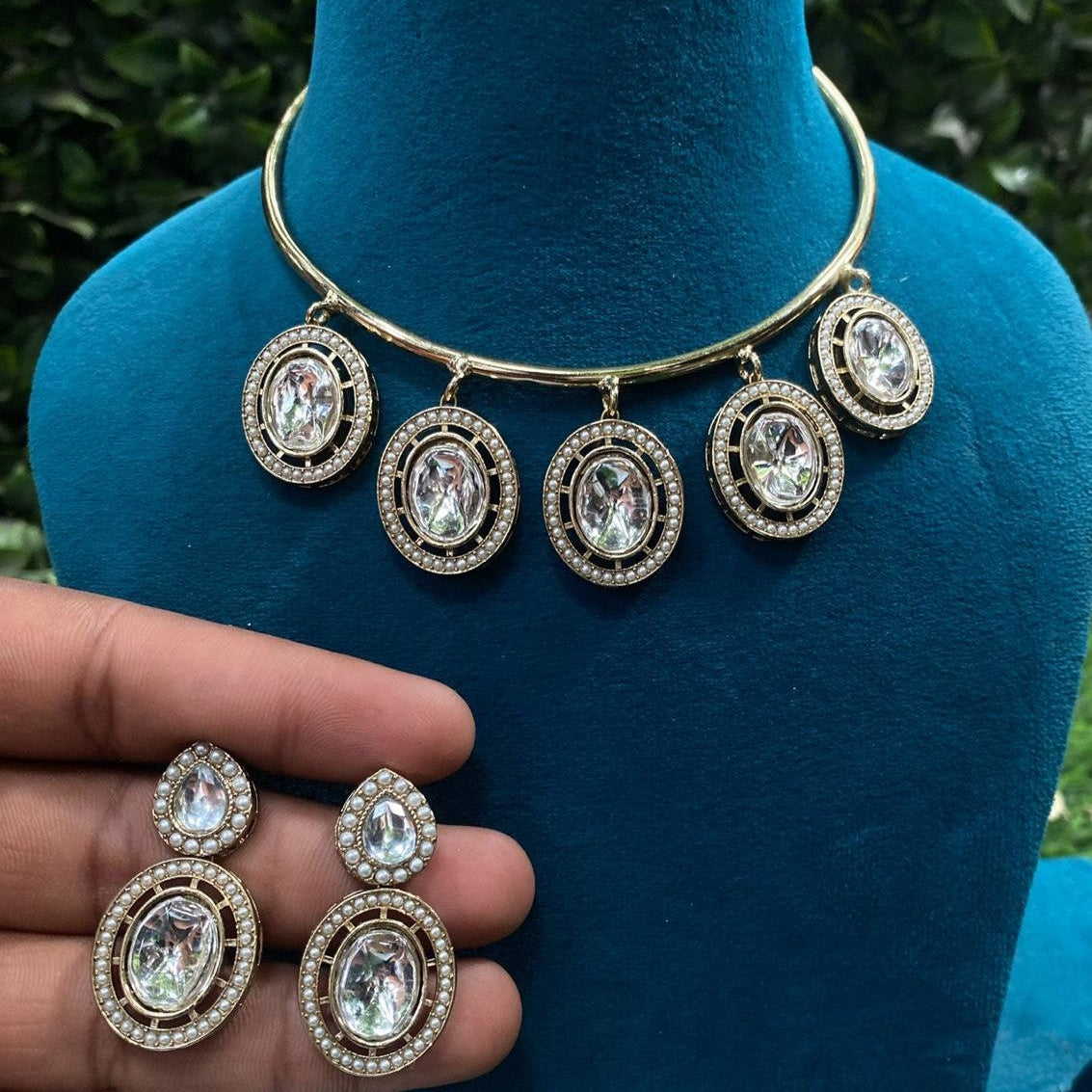 Handcrafted Gold Brass Hasli Choker with Kundan Pendant & Matching Earrings set - Sparkling Nailon